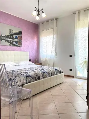 Letto o letti in una camera di La casa di Paola