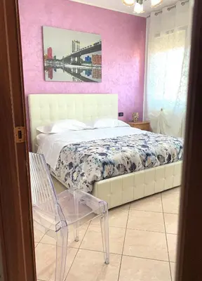 Letto o letti in una camera di La casa di Paola