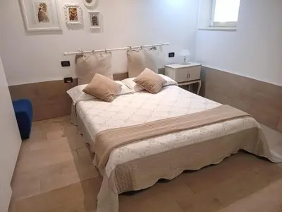 Letto o letti in una camera di Appartamento AlCova
