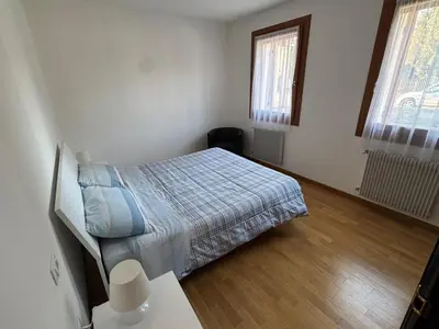 Letto o letti in una camera di Cà Maria - Appartamento con Giardino