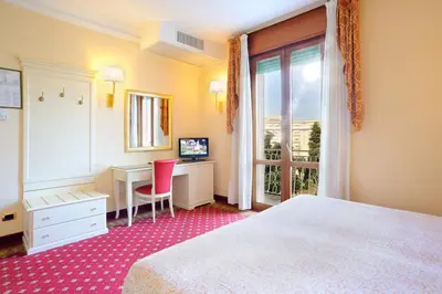 Letto o letti in una camera di Palace Hotel Meggiorato