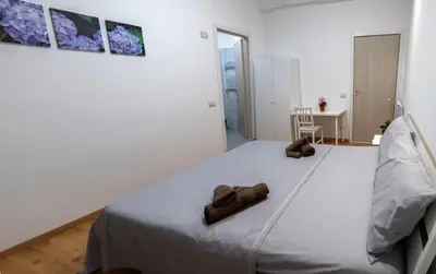 Letto o letti in una camera di CASAMINA