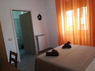 Letto o letti in una camera di CASAMINA