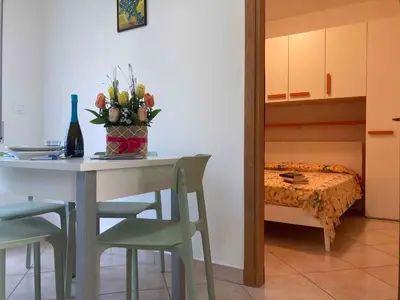 Letto o letti in una camera di Holiday home in Rosolina Mare 27838