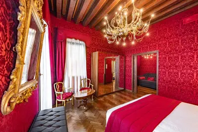 Letto o letti in una camera di Palazzo San Lorenzo