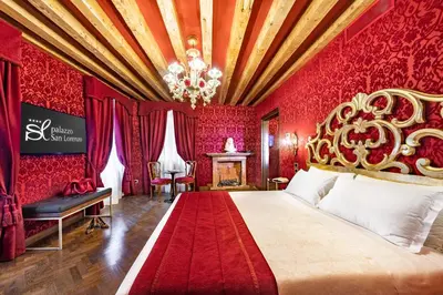 Letto o letti in una camera di Palazzo San Lorenzo