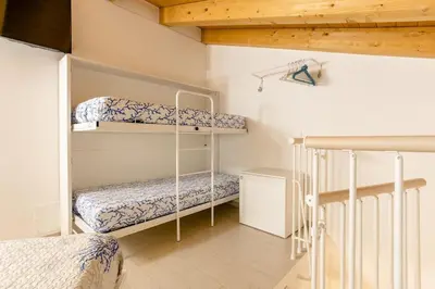 Letto o letti in una camera di La Bella Vita - La Casetta