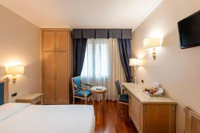 Letto o letti in una camera di Majestic Toscanelli (centro storico)