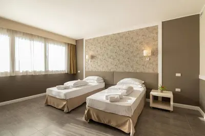 Letto o letti in una camera di Blue Dream Hotel