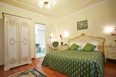 Letto o letti in una camera di Hotel San Luca Venezia
