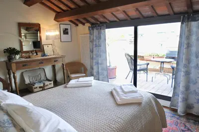 Letto o letti in una camera di B&B Vicenza San Rocco