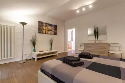 Letto o letti in una camera di ATTIC FLOOR VENICE APARTMENT