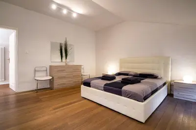 Letto o letti in una camera di ATTIC FLOOR VENICE APARTMENT