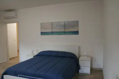Letto o letti in una camera di Casa Palladio XL