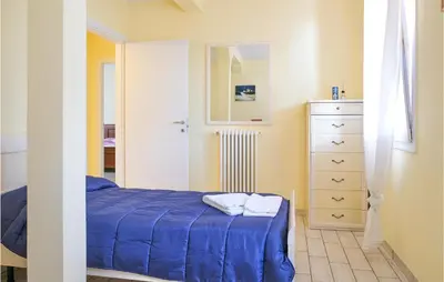 Letto o letti in una camera di Casa Marina