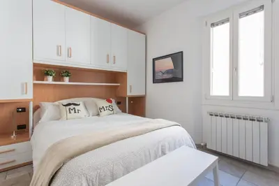 Letto o letti in una camera di Autentico Trilocale, vista mozzafiato sul Canale