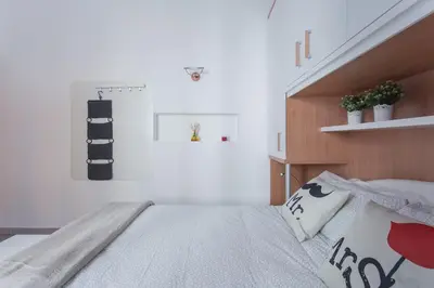 Letto o letti in una camera di Autentico Trilocale, vista mozzafiato sul Canale