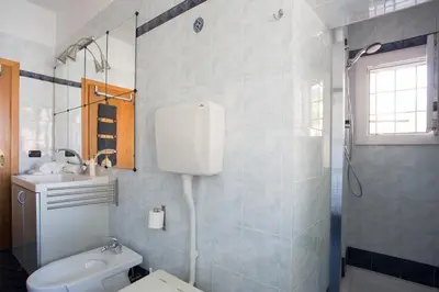 Bagno di Autentico Trilocale, vista mozzafiato sul Canale