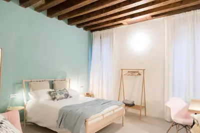 Letto o letti in una camera di Mirandolina Venice Exclusive Apartment