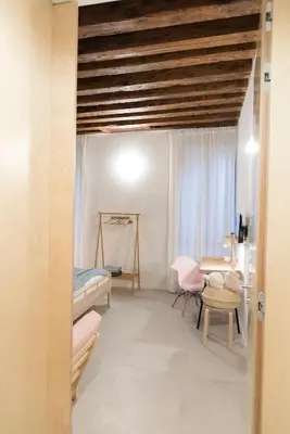 Letto o letti in una camera di Mirandolina Venice Exclusive Apartment