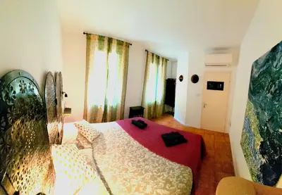 Letto o letti in una camera di The Hatter's Venice Apartment