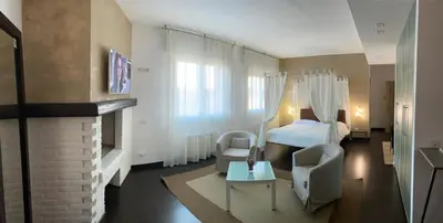Letto o letti in una camera di Hotel Angi