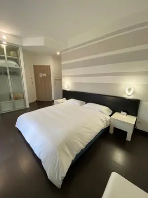 Letto o letti in una camera di Hotel Angi