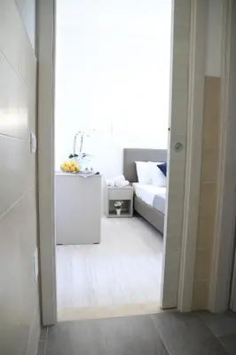 Letto o letti in una camera di Hotel Arena