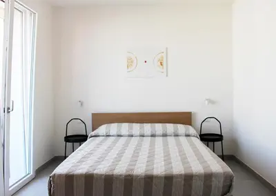 Letto o letti in una camera di Dainese Apartments, Casa Miriam