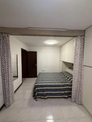 Letto o letti in una camera di Appartamento Carboncina