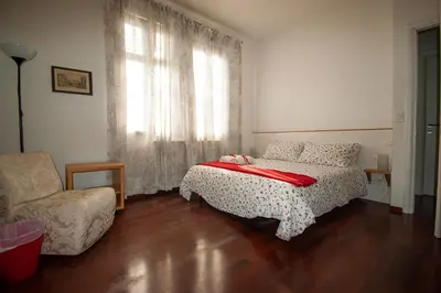 Letto o letti in una camera di B&B Ca'Isidoro