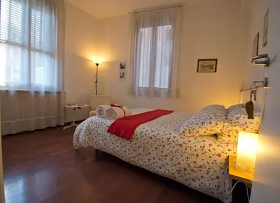 Letto o letti in una camera di B&B Ca'Isidoro