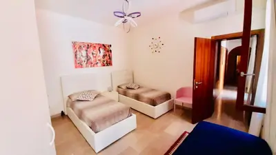Letto o letti in una camera di Ca’Tronconi ai Frari