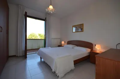 Letto o letti in una camera di Residence Perla