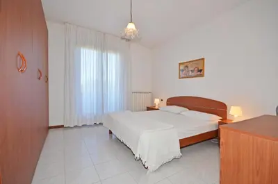 Letto o letti in una camera di Residence Perla
