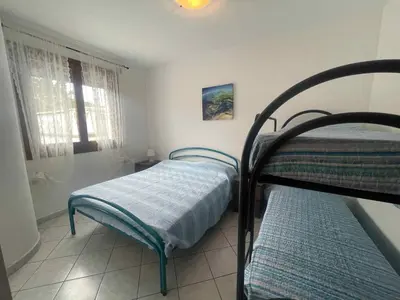 Letto o letti in una camera di Apartment in Rosolina Mare 27837