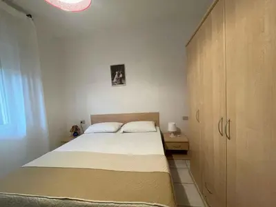 Letto o letti in una camera di Apartment in Rosolina Mare 27837