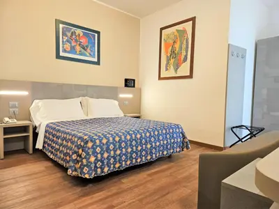Letto o letti in una camera di Hotel Ornella