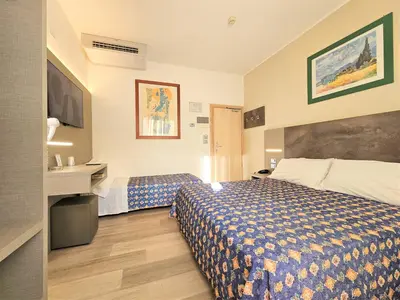 Letto o letti in una camera di Hotel Ornella