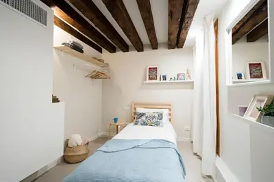Letto o letti in una camera di Mirandolina Venice Exclusive Guesthouse