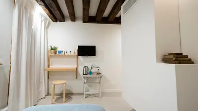 TV o dispositivi per l'intrattenimento presso Mirandolina Venice Exclusive Guesthouse