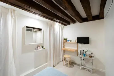 TV o dispositivi per l'intrattenimento presso Mirandolina Venice Exclusive Guesthouse
