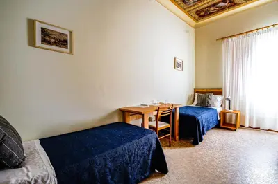 Letto o letti in una camera di Guest House Villa Angaran San Giuseppe