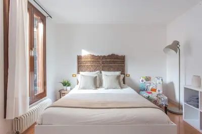 Letto o letti in una camera di Studio Ago27 by Welc(H)ome