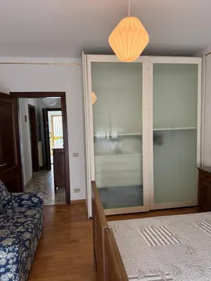 Letto o letti in una camera di Lido di Venezia Mare e Cinema