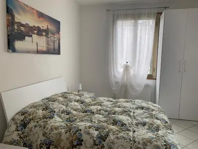 Letto o letti in una camera di Little and cozy flat near Venice