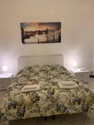 Letto o letti in una camera di Little and cozy flat near Venice