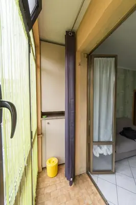 Letto o letti in una camera di Little and cozy flat near Venice