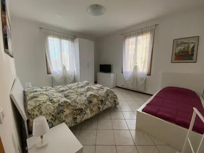 Letto o letti in una camera di Little and cozy flat near Venice