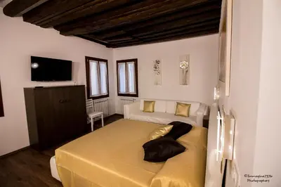 Letto o letti in una camera di Golden Suite
